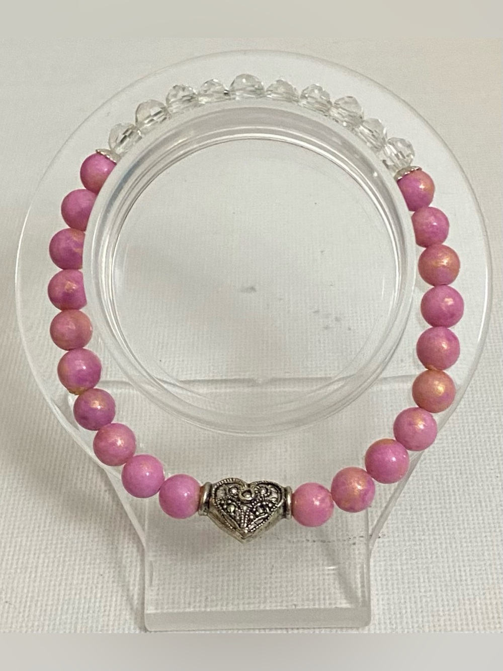 Genuine Rhodonite and Quartz crystals with heart charm bracelet